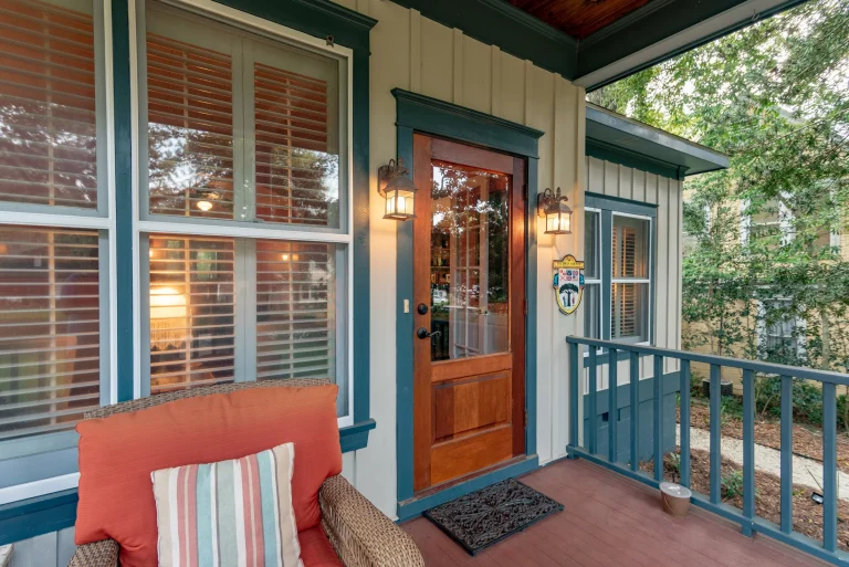 Home 9 A Porch With A Chair And A Door